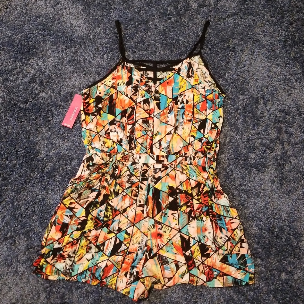 NWT multi colored romper (shorts).